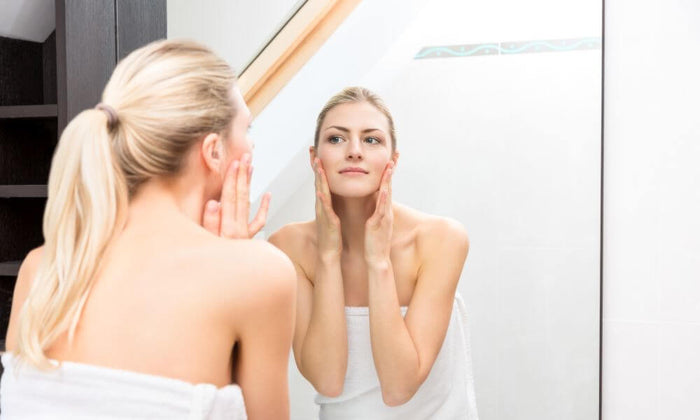 a women seeing herself in mirror