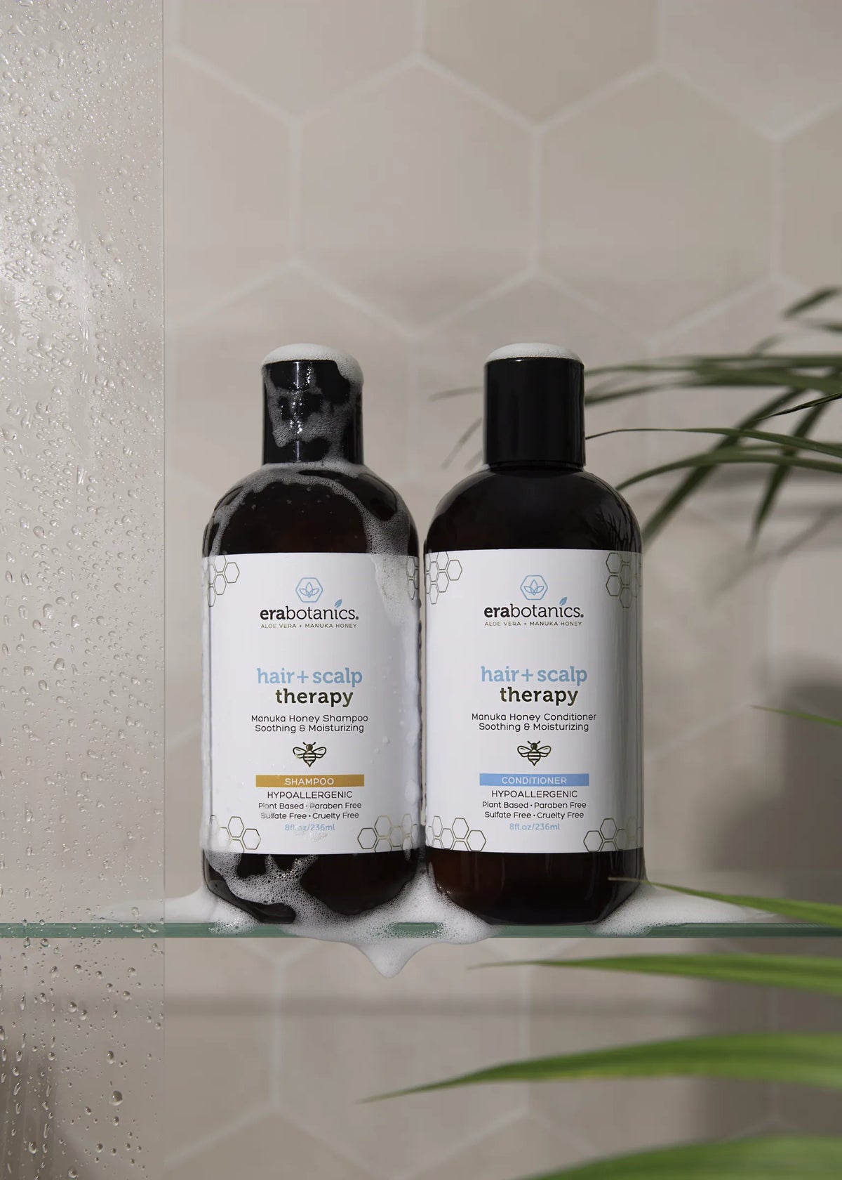 Era Organics Hair + Scalp Therapy on a shower shelf