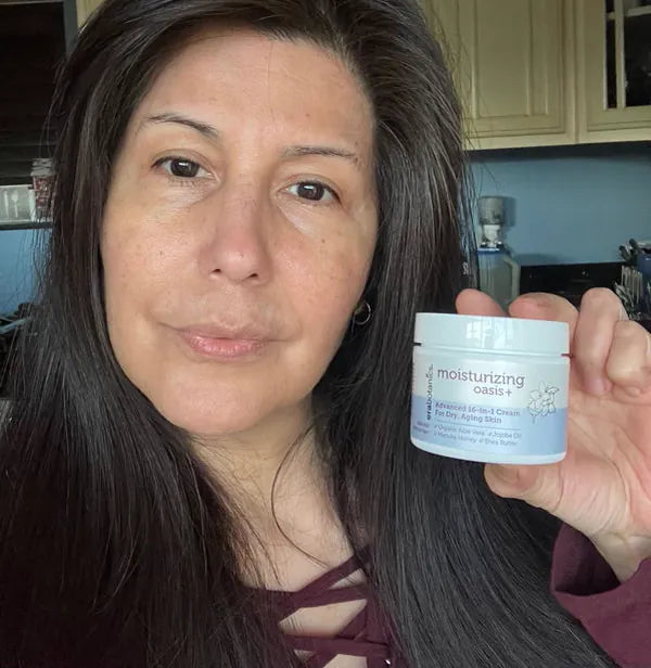 Customer selfie with a jar of Oasis moisturizer